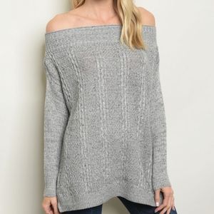 Long sleeve off the shoulder knit sweater.
